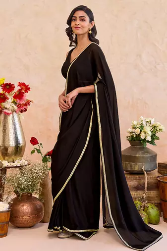 Black embroidered crepe silk blend saree set