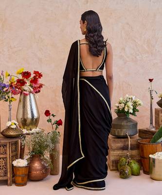 Black embroidered crepe silk blend saree set 5