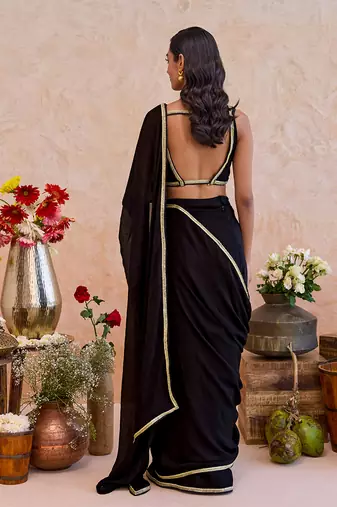 Black embroidered crepe silk blend saree set