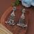Green color silver plated oxidised dangle earrings