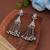 White color silver plated oxidised dangle earrings