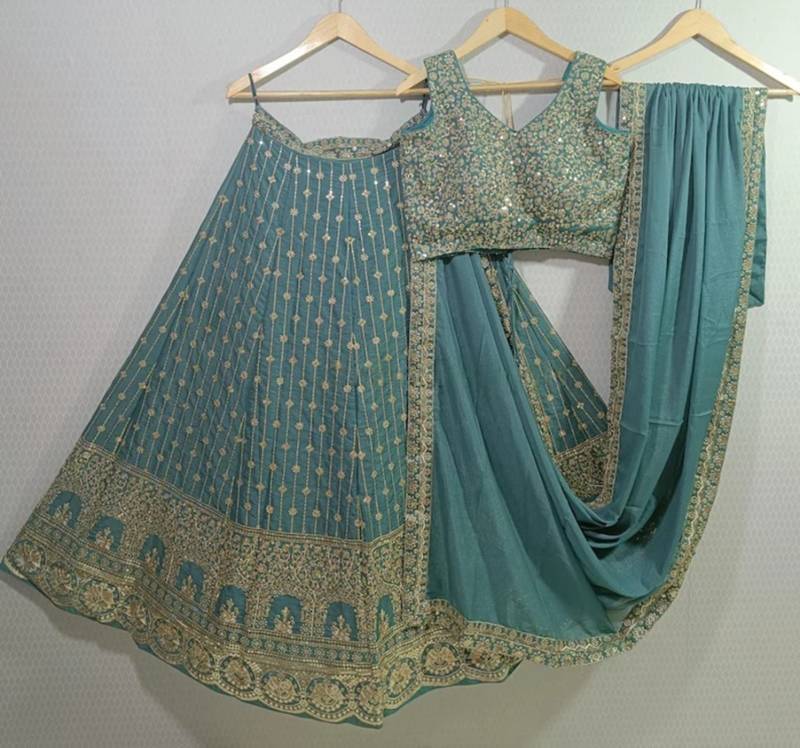 emerald green embroidered lehenga set with dupatta