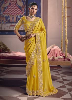 yellow tissue heavy embroidery designer saree 1