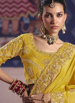 yellow tissue heavy embroidery designer saree 2