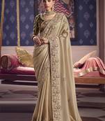 beige tissue heavy embroidery designer saree
