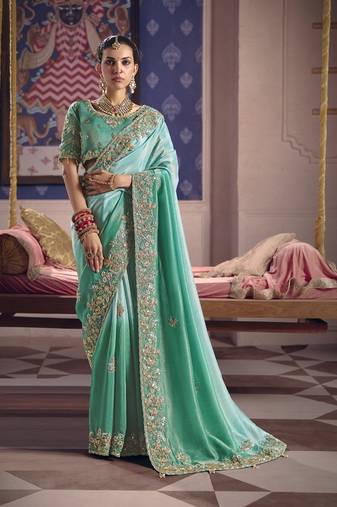 turquoise  tissue heavy embroidery designer saree