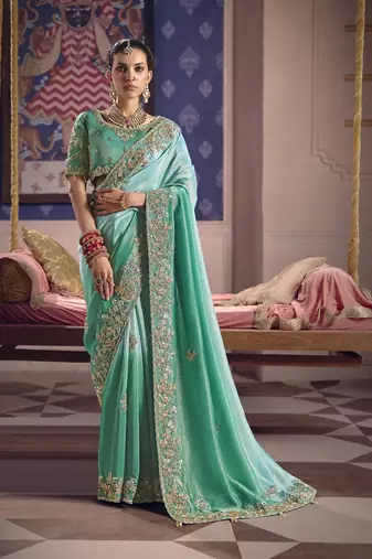 turquoise  tissue heavy embroidery designer saree