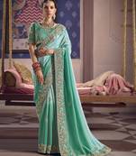 turquoise  tissue heavy embroidery designer saree
