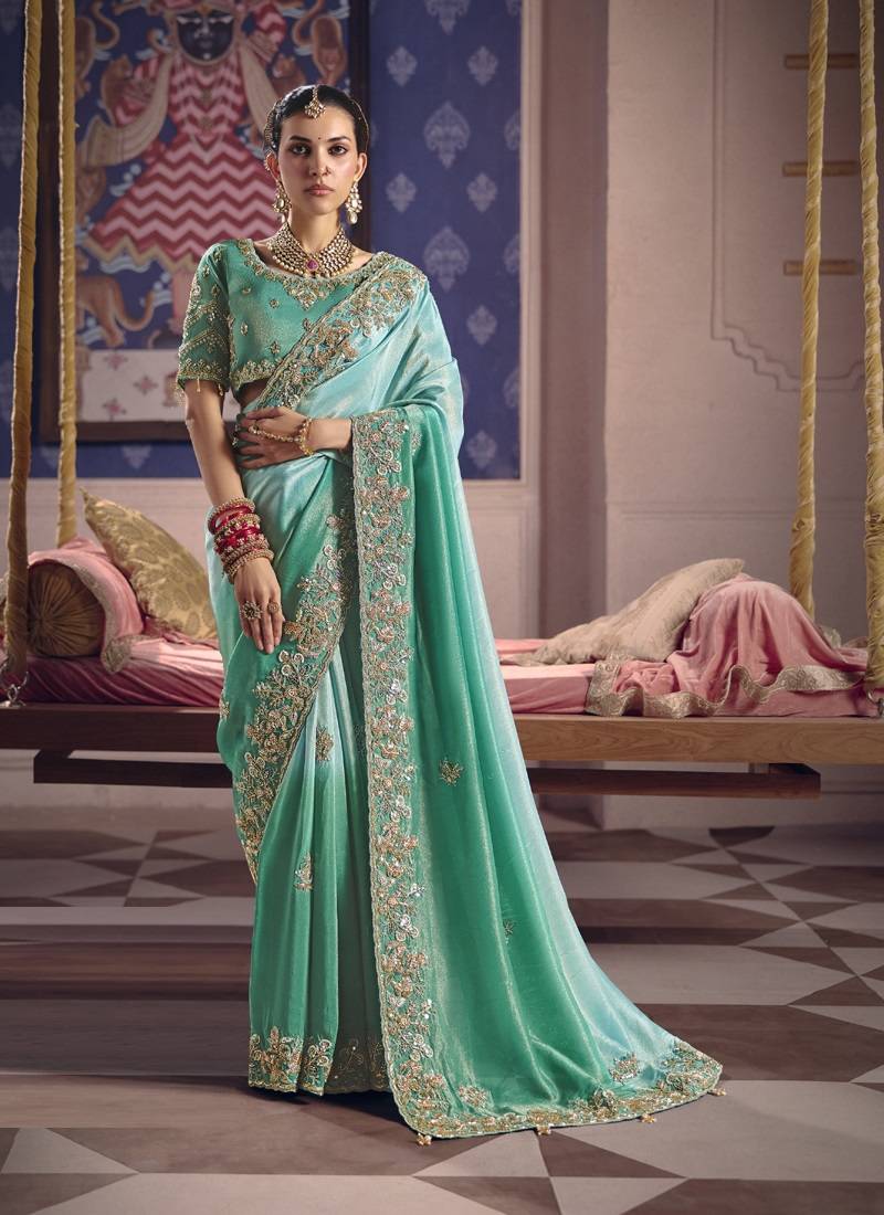 turquoise  tissue heavy embroidery designer saree