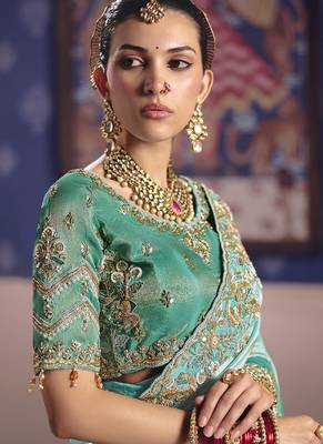 turquoise  tissue heavy embroidery designer saree 2