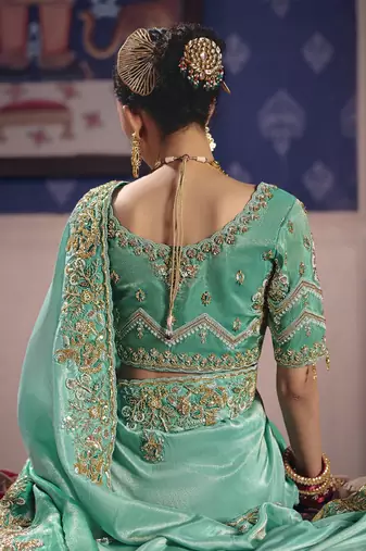 turquoise  tissue heavy embroidery designer saree