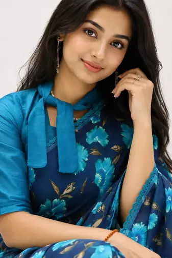 Sky color weightless floral printed sarees with unstitched blouse