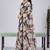 Black color weightless floral printed sarees with unstitched blouse