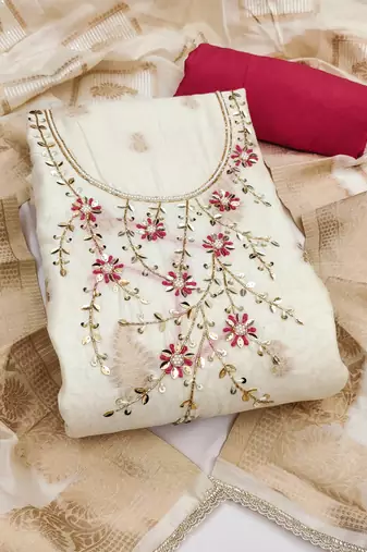Cream banarasi cotton woven design unstitched dress material.