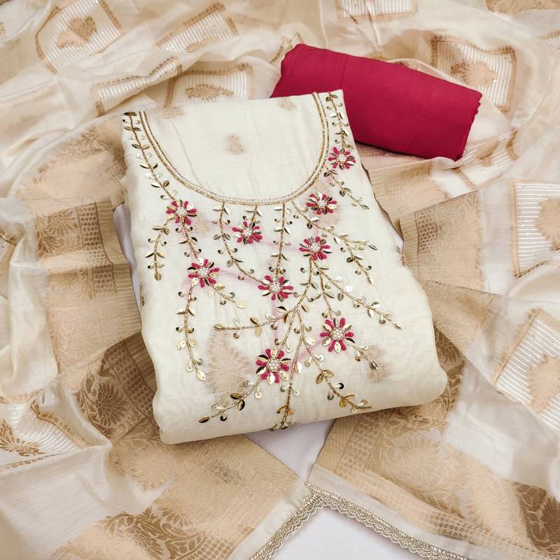 Cream banarasi cotton woven design unstitched dress material.