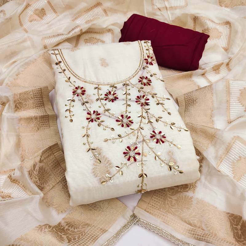 Cream banarasi cotton woven design unstitched dress material.
