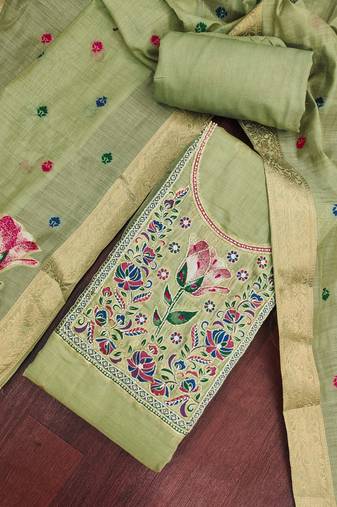 Green banarasi cotton woven design unstitched dress material.