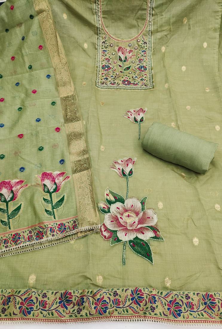 Green banarasi cotton woven design unstitched dress material.