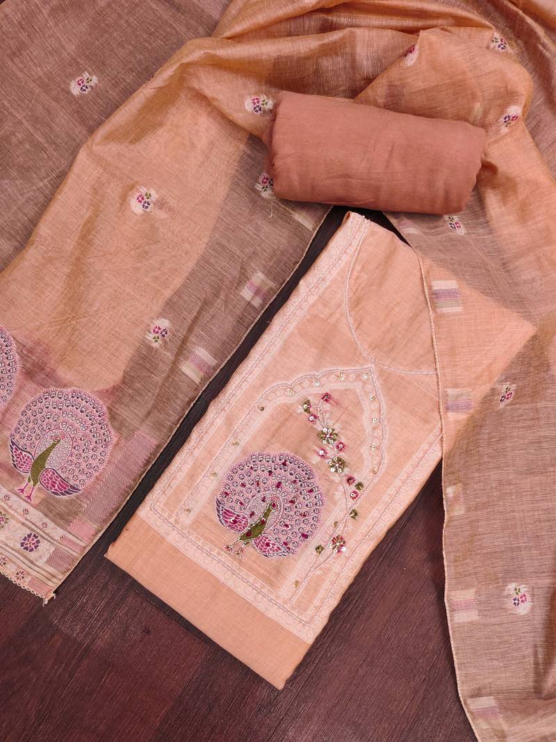 Peach banarasi cotton woven design unstitched dress material.