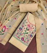 Beige banarasi cotton woven design unstitched dress material.