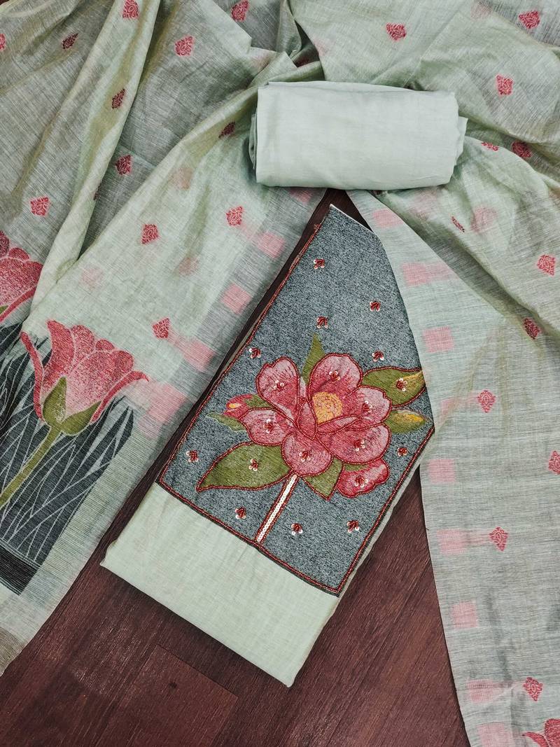 Sea green banarasi cotton woven design unstitched dress material.
