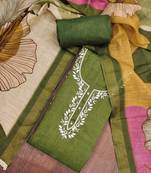 Green linen cotton printed unstitched dress material.