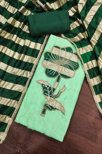 Green cotton embroidered unstitched dress material.