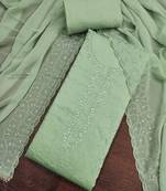 Sea green cotton embroidered unstitched dress material.