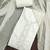 White cotton embroidered unstitched dress material.