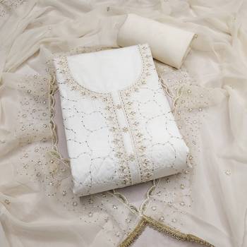 White cotton embroidered unstitched dress material. 2
