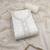 White cotton embroidered unstitched dress material.