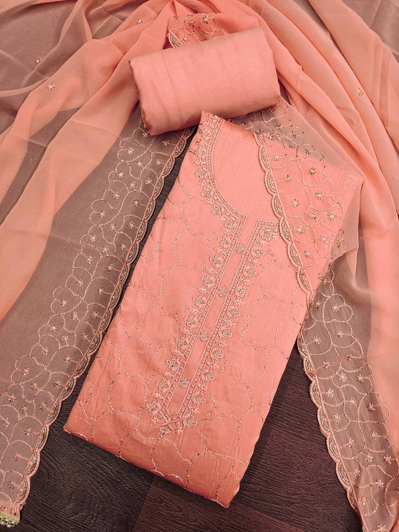 Peach cotton embroidered unstitched dress material.