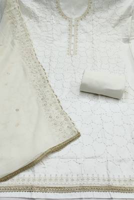 White cotton embroidered unstitched dress material. 3