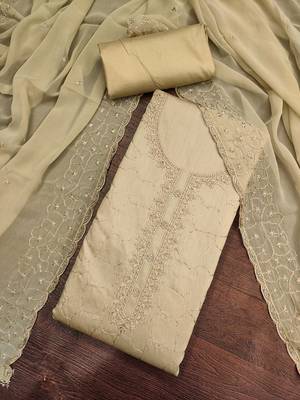 beige cotton embroidered unstitched dress material. 1