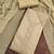 beige cotton embroidered unstitched dress material.