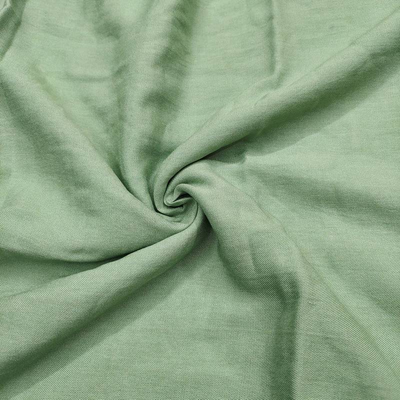Sea green cotton embroidered unstitched dress material.