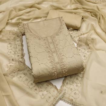 beige cotton embroidered unstitched dress material. 2