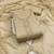 beige cotton embroidered unstitched dress material.
