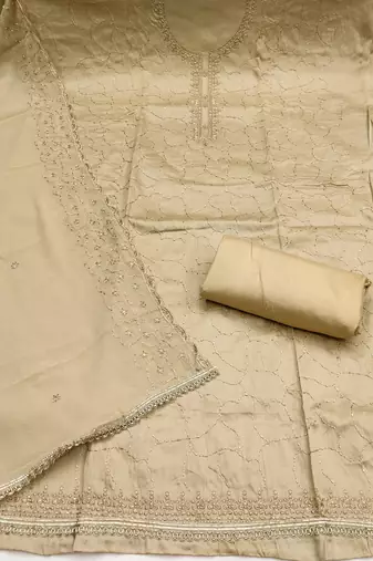 beige cotton embroidered unstitched dress material.