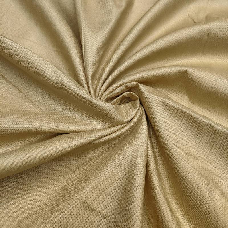beige cotton embroidered unstitched dress material.