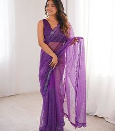 Purple net sequins work embroidered saree