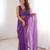 Purple net sequins work embroidered saree