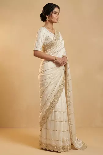 Cream two tone embroidered fendi satin saree 