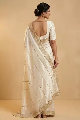 Cream two tone embroidered fendi satin saree 