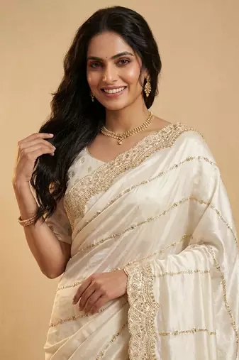 Cream two tone embroidered fendi satin saree 