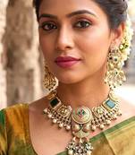 antique gold temple jewelry set with choker necklace and jhumka earrings
