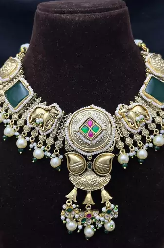 antique gold temple jewelry set with choker necklace and jhumka earrings