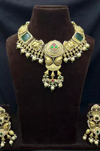 antique gold temple jewelry set with choker necklace and jhumka earrings