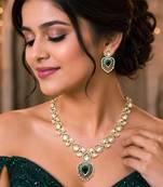 emerald green kundan necklace set with gold teardrop pendant