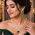 emerald green kundan necklace set with gold teardrop pendant